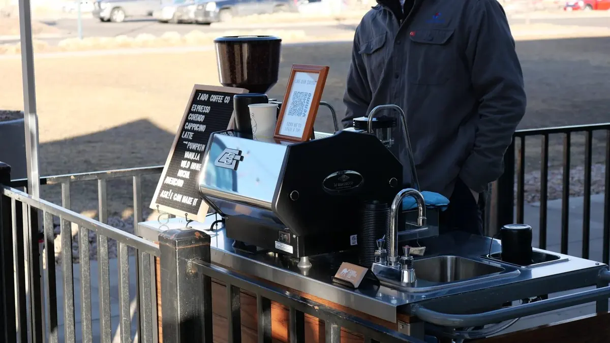 The Zado cart set up outdoors by a railing